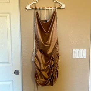 Golden ruched mini dress